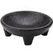 A black polypropylene molcajete bowl with a wooden base.