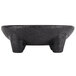 A black polypropylene molcajete with legs.