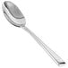 A Front of the House Parker stainless steel teaspoon with a silver handle and spoon.