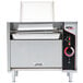 An APW Wyott vertical conveyor bun grill toaster with the lid open on a counter.