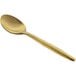 A Front of the House Owen 18/10 Stainless Steel Matte Brass Teaspoon with a white background.