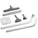 The Clarke Comfort Pak vacuum cleaner with a set of accessories including a brush.