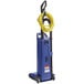 A Clarke CarpetMaster 212 blue vacuum cleaner with a yellow tube.