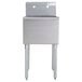 An Advance Tabco stainless steel utility sink with legs and a drain.