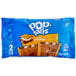 A blue Pop-Tarts S'mores 2-pack with a close-up of a frosted pastry with chocolate and vanilla filling.