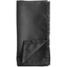 A folded black Oxford cloth napkin.