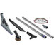 A ProTeam GoFit backpack vacuum with various tools and accessories.