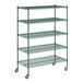 A green metal wire shelving unit with four shelves.