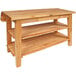A John Boos maple kitchen island with shelves underneath.