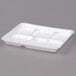 A white styrofoam tray with five compartments.