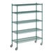 A green metal Regency wire shelving unit with wheels.