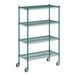 A green metal Regency wire shelving unit with wheels.