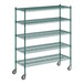 A green metal Regency wire shelving unit with wheels.