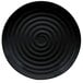 A black melamine plate with a spiral pattern on it.