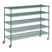 A green metal wire shelving unit with four shelves on white background.