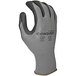 A close-up of a Cordova Conquest gray nylon glove with black micro-foam nitrile palm coating.