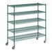 A green metal wire shelving unit with five shelves.