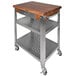 A wood and metal John Boos kitchen cart.