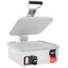 A white rectangular Vollrath panini grill with a metal frame.