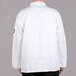 a white shirt with a patch on the back