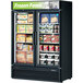 A black Turbo Air glass door freezer filled with frozen foods.