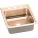 A CuVerro antimicrobial copper drop-in sink with three faucet holes on a counter.