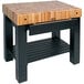A John Boos black maple wood work table with undershelf and drawer.