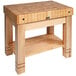 A John Boos natural maple wood table with an undershelf and drawer.