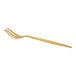 A close-up of the gold handle on an Acopa Odin stainless steel fork.