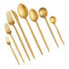 A close-up of an Acopa Odin gold extra heavy weight stainless steel fork.