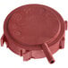 A red plastic cap with a couple of holes.