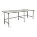 An Advance Tabco stainless steel work table with an open base and a backsplash on legs.