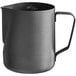 An Acopa black metal frothing pitcher with a handle.