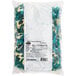 A white bag of blue and white Albanese Blue Gummi Sharks.
