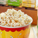 A bowl of Amish Country Ladyfinger Butterfly popcorn kernels.