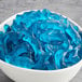 A bowl of blue gummy dolphins.