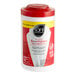 A white plastic container of Sani Professional sanitizing wipes with a red lid.