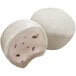 A close-up of a My/Mochi Cookies and Cream Mochi Ice Cream ball.