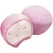 Two pink and white My/Mochi strawberry mochi ice cream pieces.