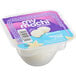 A container of My/Mochi Vanilla Bean Mochi Ice Cream with a lid on it.