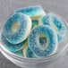 A bowl of blue and white Kervan Gummy Blue Raspberry Rings.