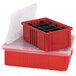 A black Quantum conductive divider for a red plastic container with black compartments.