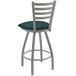 A white Holland Bar Stool ladderback swivel counter stool with a blue cushion.