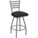 A black Holland Barstool Jackie ladderback swivel bar stool with a black iron seat.