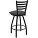 A Holland Bar Stool black ladderback swivel bar stool with a black seat.