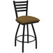 A black Holland Bar Stool ladderback swivel bar stool with a brown saddle seat.