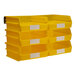 A yellow plastic Triton LocBin with white labels on the front.