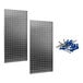 Two stainless steel Triton LocBoards leaning against a white wall.