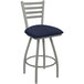 A Holland Bar Stool swivel bar stool with a blue seat and back with a graph anchor design.