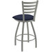 A Holland Bar Stool Jackie Ladderback Swivel Bar Stool with a Graph Anchor seat and an Anodized Nickel finish with blue and white cushions.